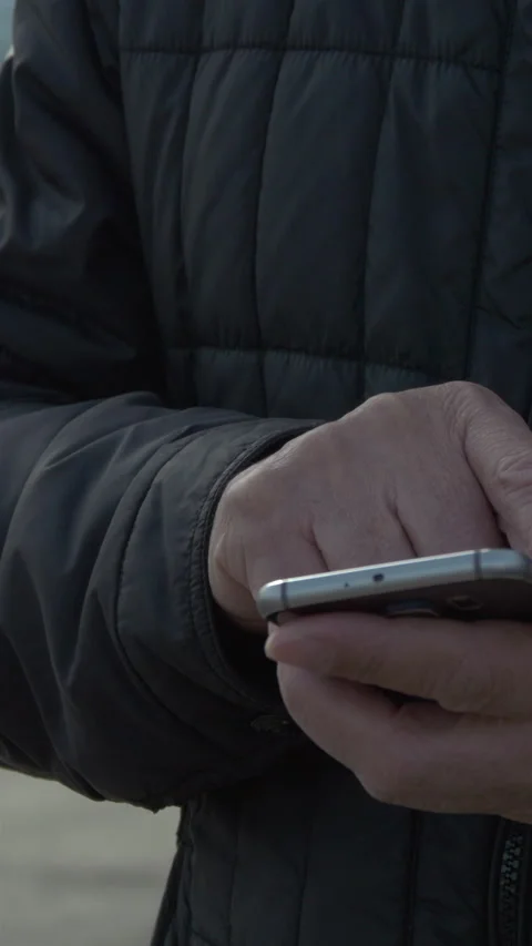 Senior Man Using Smartphone For Online Messaging. Vertical Stock Footage 272179346