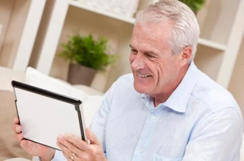 Senior man using tablet computer 스톡 사진