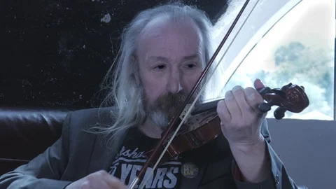 Senior man on violin Stock Footage 111553162