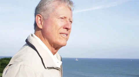 Senior Man Watching the Ocean Stock Footage 48343956