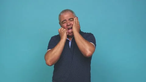 Senior man whining and crying disconsolately Video stock 144217765