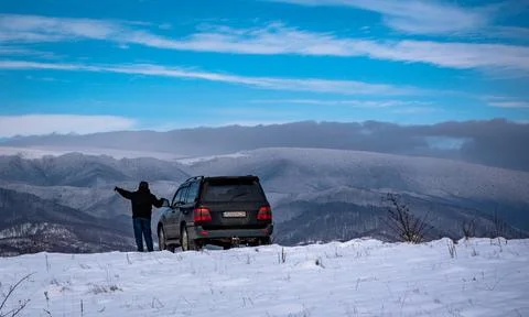 Senior man in winter mountains Stock Photos