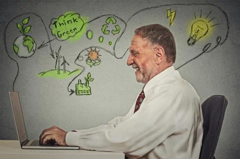 Senior man working on computer solving ecology problems 스톡 사진