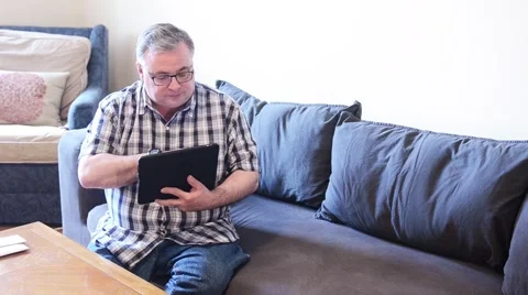 Senior Man Working on Tablet Stock Footage 49159548