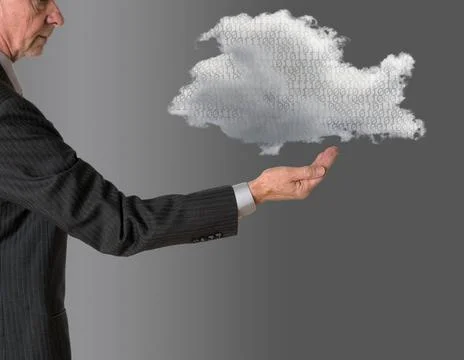 Senior manager with floating cloud computing Senior male caucasian executi... Stock Photos