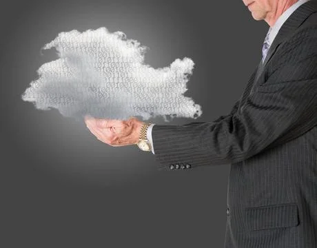 Senior manager holding cloud computing Senior male caucasian executive hol... Stock Photos