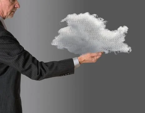 Senior manager holding cloud computing Senior male caucasian executive hol... Foto stock