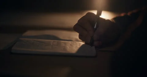 Senior manager writing in notepad at desk in office Stock Footage 268437068