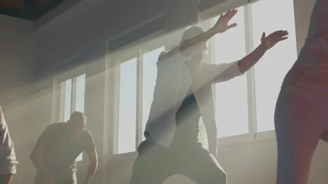 Senior men practicing tai chi in sunlight indoor Video stock 195662018