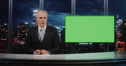 Senior News Presenter Reporting Live from Studio with Green Screen for Dynamic 스톡 동영상 332575221