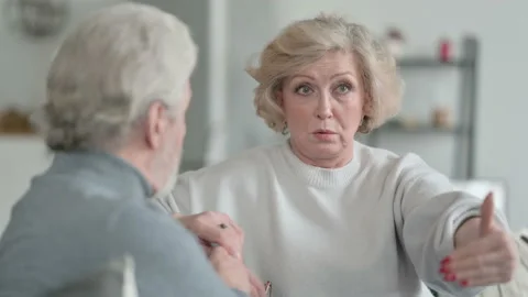 Senior Old Couple having Conversation on Sofa Video stock 148201065