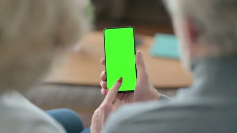 Senior Old Couple using Smartphone with Green Chroma Key Screen Video stock 148200508