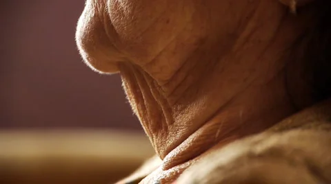Senior old woman throat neck wrinkle skin close up Stock Footage