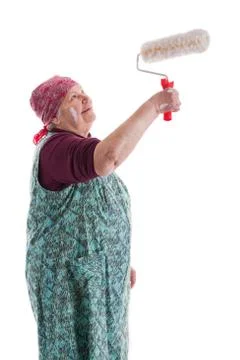 Senior with a paint roller Stock Photos