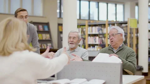 Senior people disputing with each other during class in library Stock-Footage 232620619
