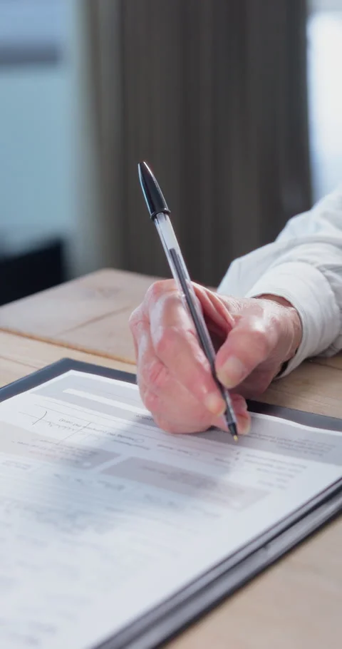Senior, person and hands with documents for signature, retirement contract or 库存影片 340889699