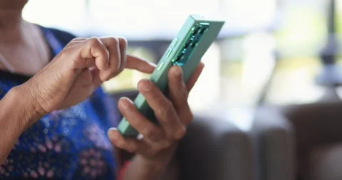 Senior person using a smartphone and tapping the screen. digital technology.. Stock Footage 339018793