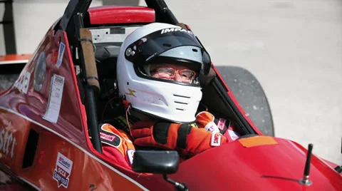 Senior pilot preparing for race Stock Footage 31851401