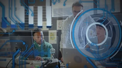 Senior pointing at laptop, guiding tech team reviewing code while transparent Stock Footage 333949627