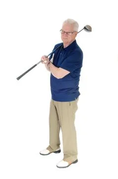 Senior practicing golf at home. Stock Photos