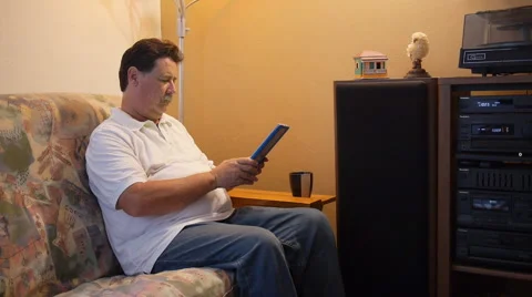 Senior professional man typing on tablet computer 5 Stock Footage 40728342