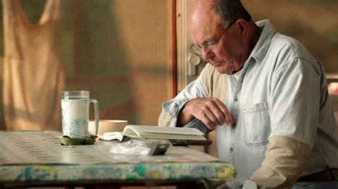 Senior reading book Stock-Footage 34545422