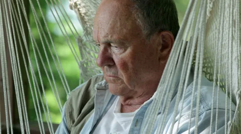 Senior reading book Video stock 34596114