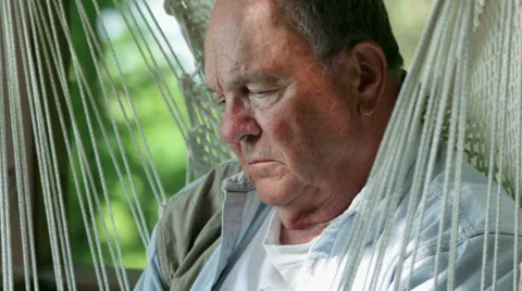 Senior reading book Video stock 34757432