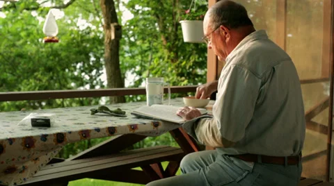 Senior reading book Stock Footage 34759661