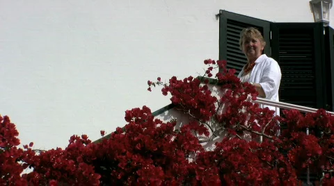 Senior relaxing at a Villa in the sun  Stock Footage 751277