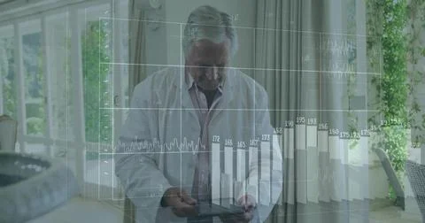 Senior researcher interpreting augmented data in consulting room, with tablet Stock Photos