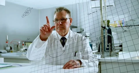 Senior researcher pointing to clear grid as grid appearing, drawing math across Stock Footage 330427741