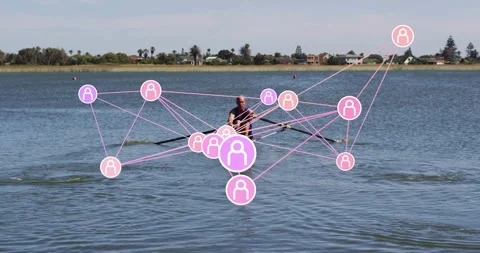 Senior rower starting with oar pull, rowing on lake, pink network shifting Stock Footage 330546231