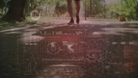 Senior runner lower legs moving on sunlit park path, displaying fitness tech HUD Stock Footage 308026144