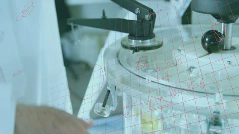 Senior scientist reaching for knob, calibrating apparatus while red grid and Stockbeeldmateriaal 334883945