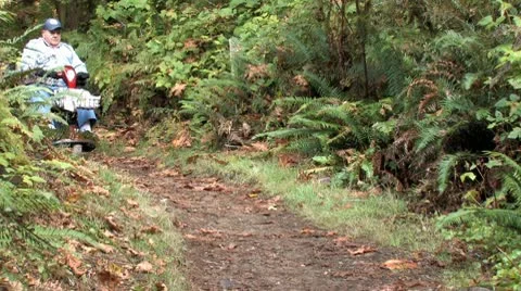 Senior on Scooter 스톡 동영상 10586820