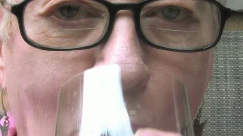 Senior Sipping Wine Video stock 11408064