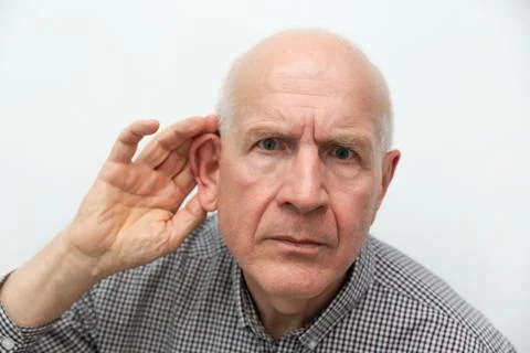Senior suffering from deafness Foto stock