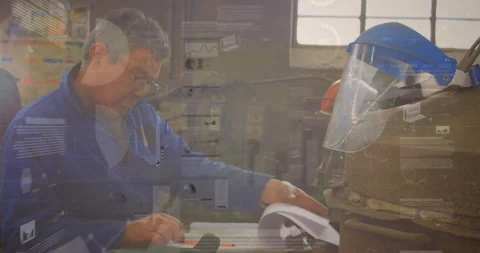 Senior tech writing notes, pulling roll at bench, animated tags marking visor Stock Footage 331567847