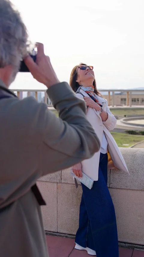 Senior tourist posing while husband taking photo. Stock Footage 270696271