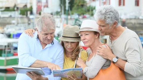 Senior tourists using tablet on visiting journey Video stock 55183228