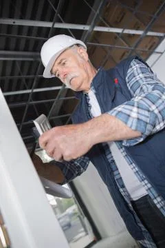Senior tradesman at work Stock Photos