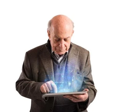 Senior uses tablet Stock Photos