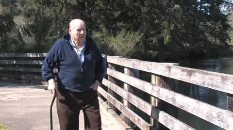 Senior Walking Along River 2 Stock Footage 5435865