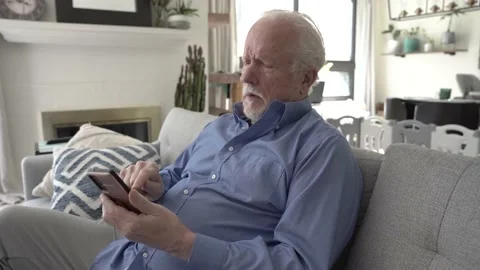 Senior white male using a mobile phone. Stock Footage 194413258