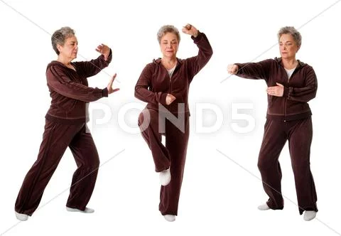 Senior woman doing tai chi yoga exercise Stock Photos