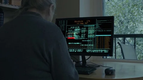 Senior woman hacking computer. Funny situation Stock Footage 121964030
