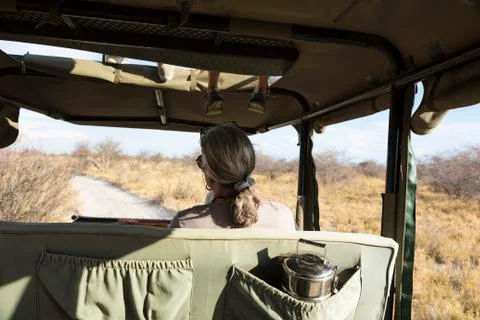 Senior woman in safari vehicle, Kalahari Desert, Makgadikgadi Salt Pans, Stock Photos