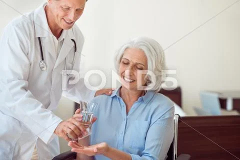 Senior Woman Taking Pills