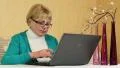 Senior woman types text uses laptop. Woman with notebook HD Footage
